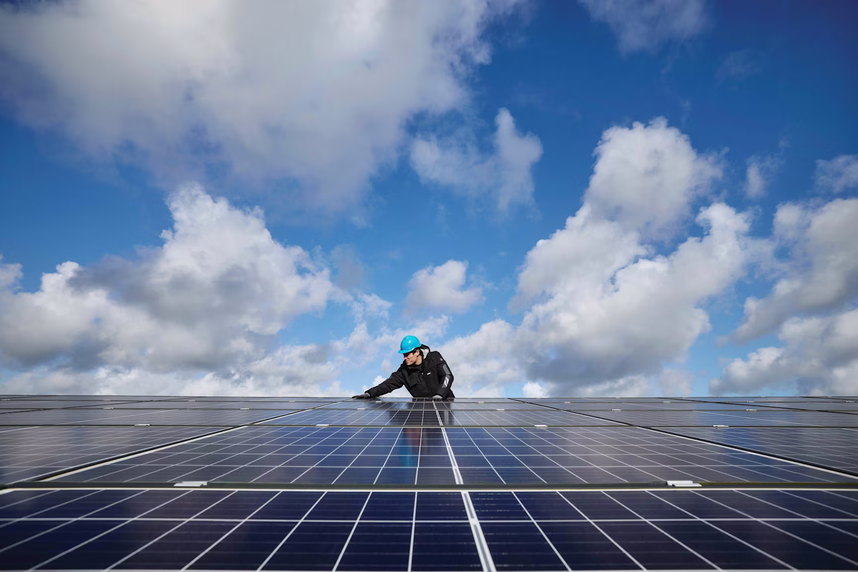 Man on solar panels