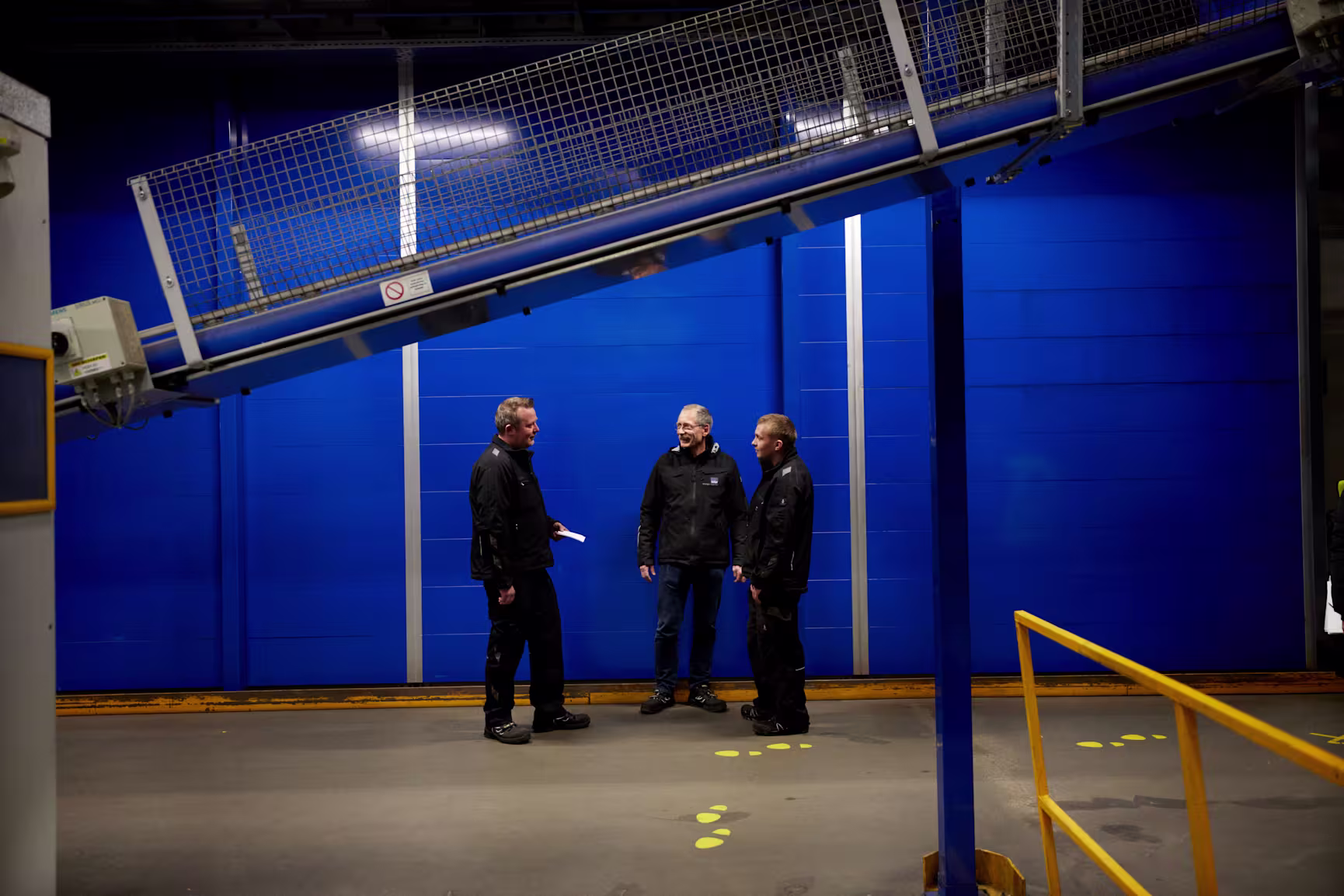 Warehouse employees standing