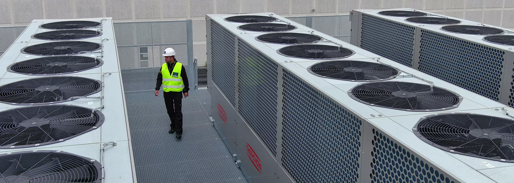 Man between Thermonova heat pumps