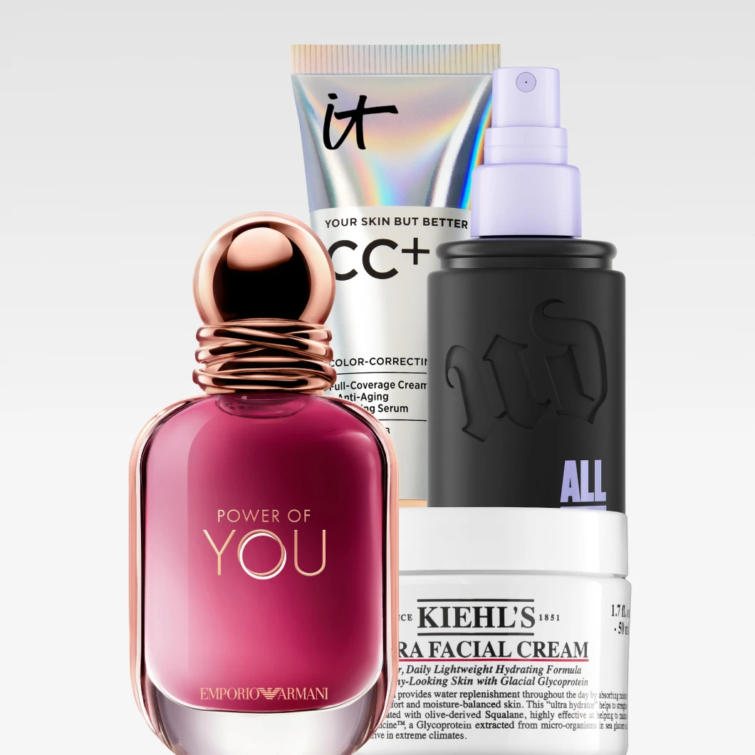 Närbild av utvalda beautyprodukter med Emporio Armani Power of You-parfym i förgrunden, IT Cosmetics “YOUR SKIN BUT BETTER CC+” och Urban Decay “ALL NIGHTER” bakom samt Kiehl’s Ultra Facial Cream längst ned. Synlig text omfattar produktnamnen “POWER OF YOU”, “EMPORIO ARMANI”, “YOUR SKIN BUT BETTER CC+”, “ALL NIGHTER” och “KIEHL’S ULTRA FACIAL CREAM”.