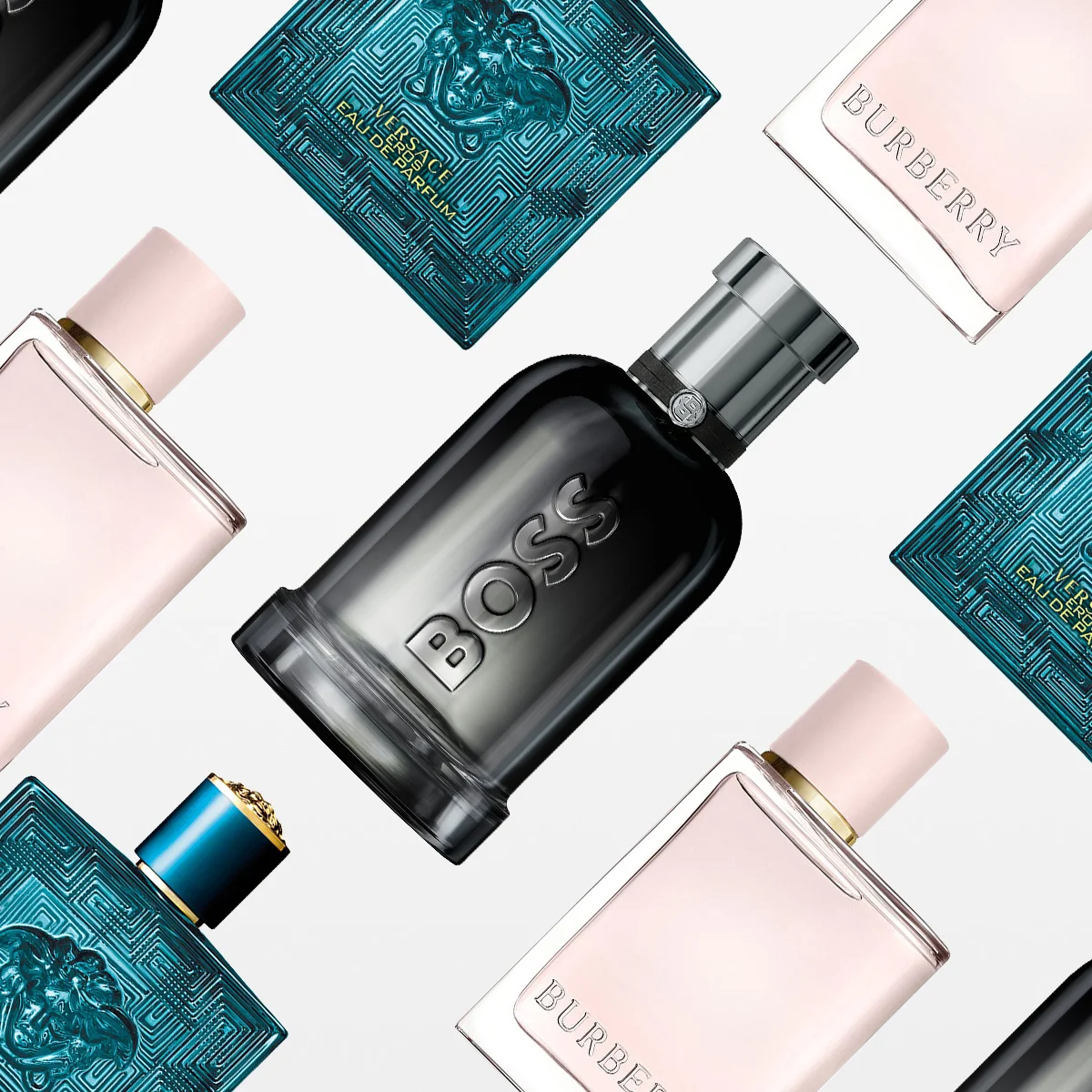 Useita ylellisiä hajuvesipulloja brändeiltä kuten Hugo Boss, Versace ja Burberry on aseteltu vaalealle taustalle. Kuvassa on tuoksuja sekä miehille että naisille tyylikkäissä mustissa, turkooseissa ja vaaleanpunaisissa pulloissa. Kuva viestii luksusta, tyyliä ja yksilöllistä tuoksua.