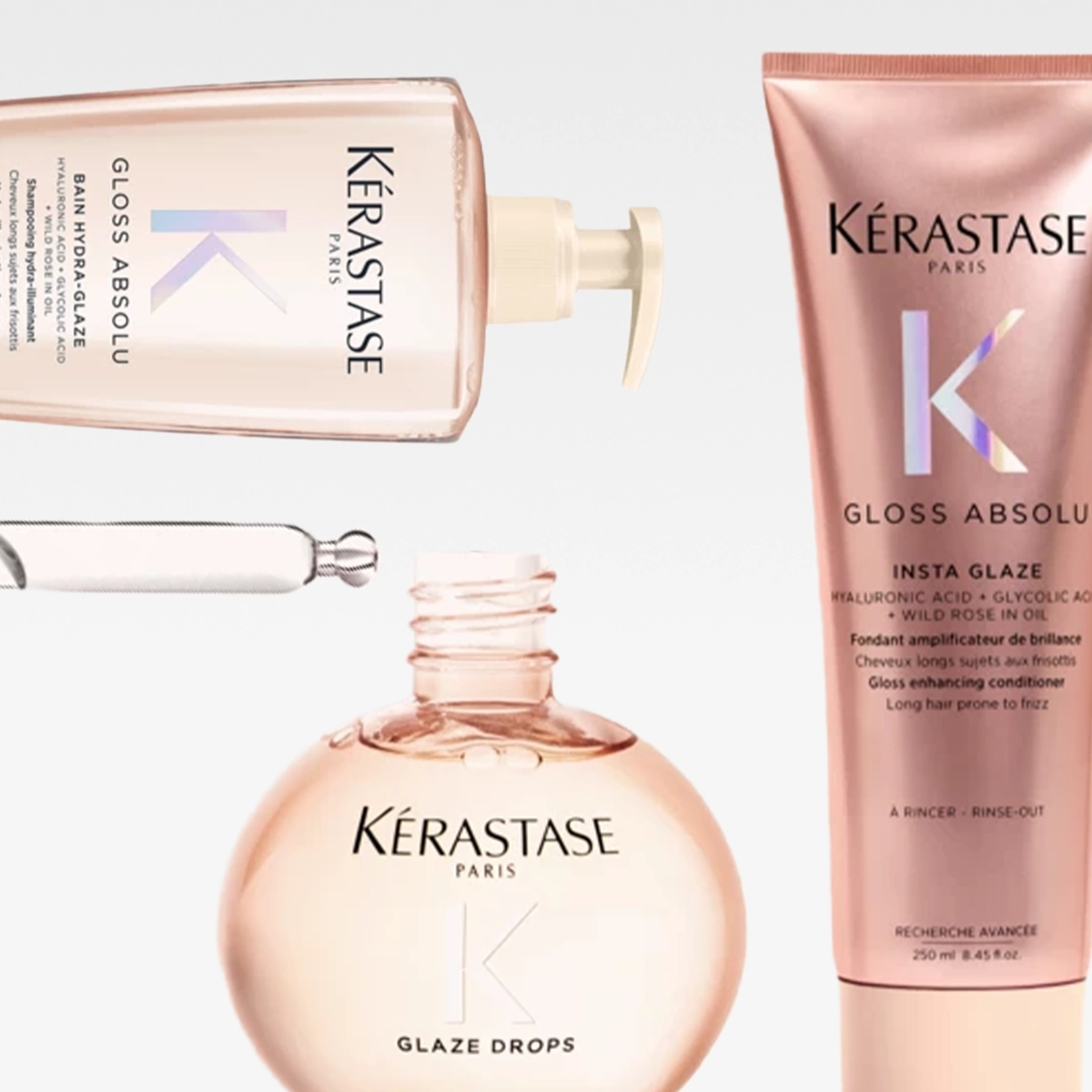 Tässä kuvassa on neljä Kérastase Paris -hiustenhoitotuotetta Gloss Absolu -sarjasta. Vasemmalla ylhäällä on Bain Hydra-Glaze -shampoo pumppupullossa, oikealla ylhäällä Insta Glaze -hoitoaine tuubissa, keskellä alhaalla Glaze Drops -kiiltotipat pyöreässä pullossa ja vasemmalla keskellä pipetti.