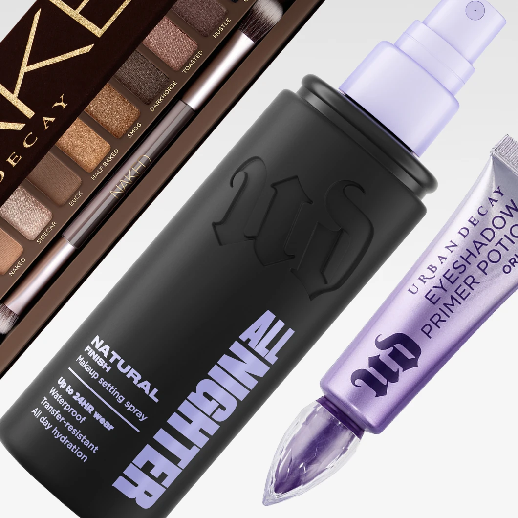 Urban Decay Naked -luomiväripaletti siveltimineen, All Nighter Setting Spray Natural Finish sekä Eyeshadow Primer Potion Original näkyvät yhdessä. Tuotteissa näkyvät muun muassa tekstit "NAKED", "ALL NIGHTER", "NATURAL FINISH" ja "EYESHADOW PRIMER POTION ORIGINAL".