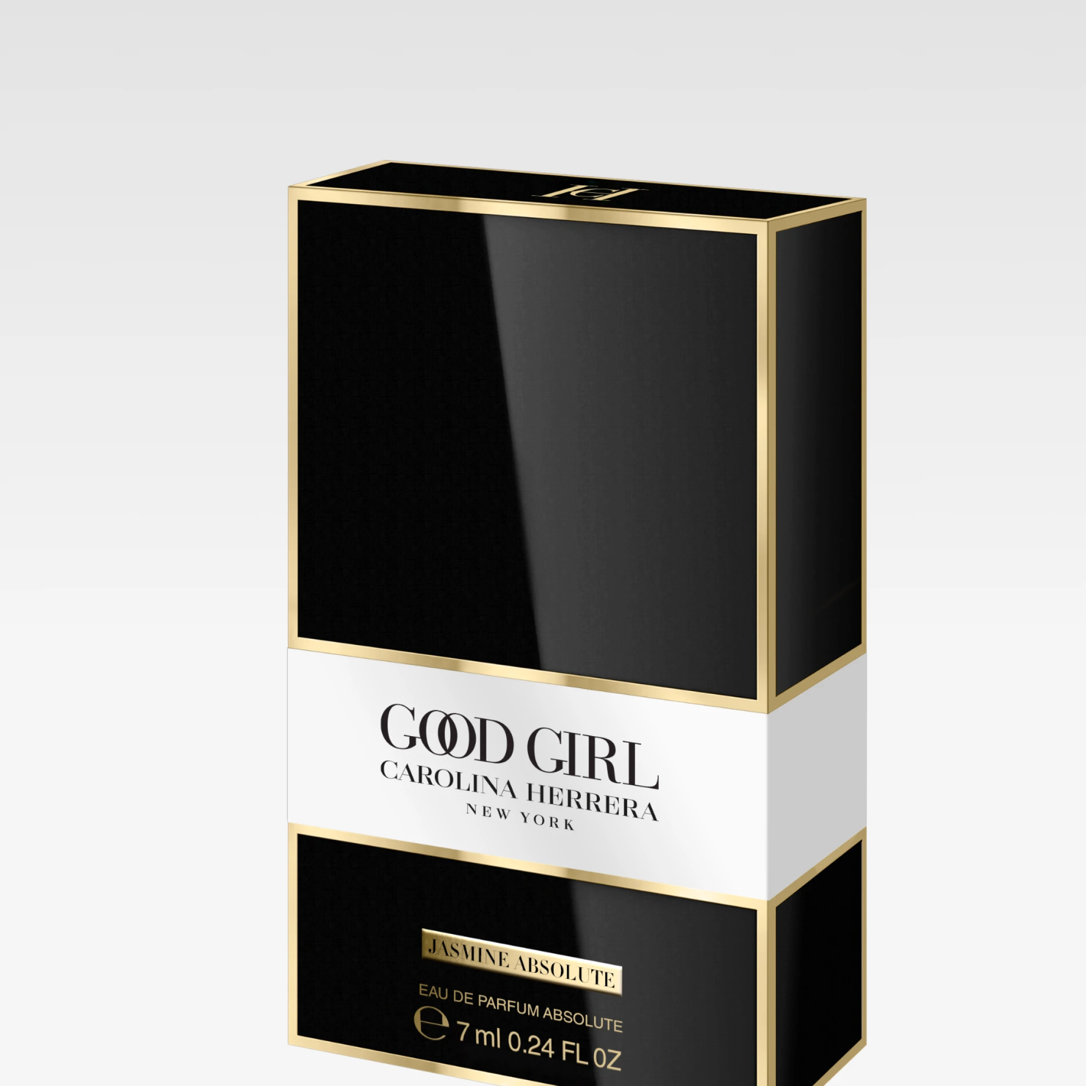 Svart och vit parfymförpackning med gulddetaljer från Carolina Herrera, märkt ”Good Girl Jasmine Absolute”, fotograferad mot ljus bakgrund.