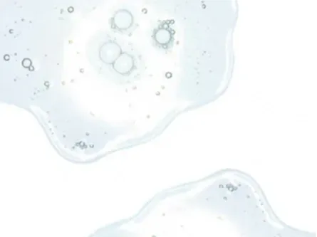 Närbild på genomskinlig gel- eller serumtextur med små bubblor