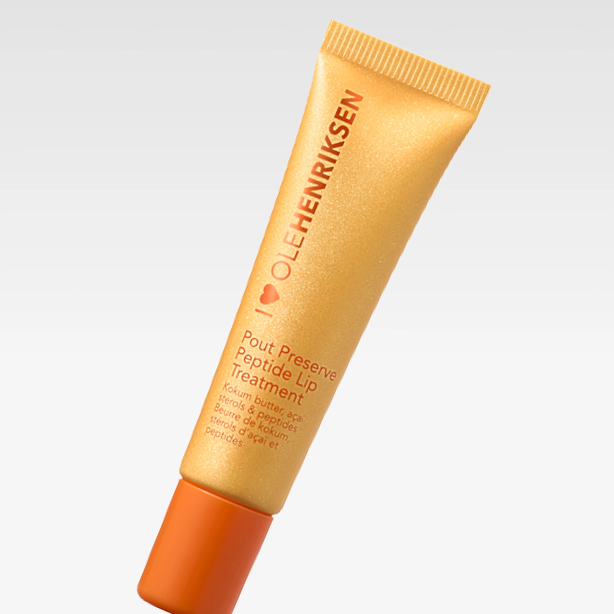 Ole Henriksen Pout Preserve Peptide Lip Treatment leppepleie i gul tube med oransje kork og teksten “I ♥ OLEHENRIKSEN”.