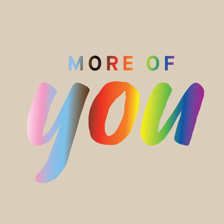 Fargerik pride-banner med regnbuefarger og teksten "more of you".