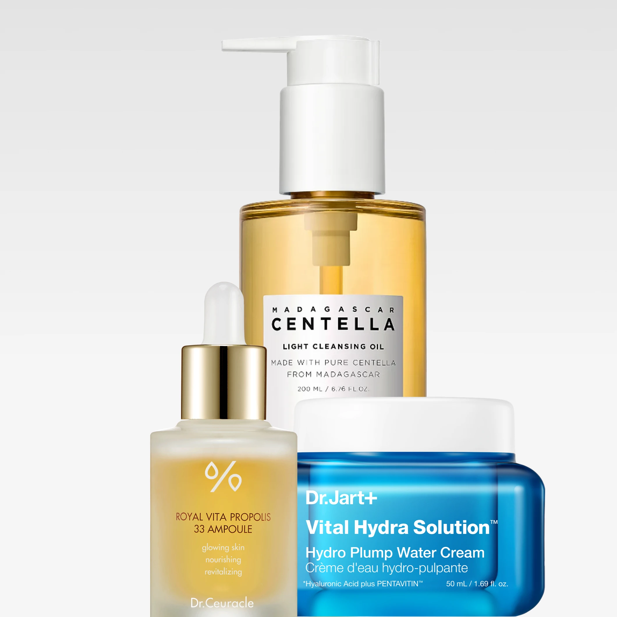 Ihonhoitotuotteita: “Madagascar Centella Light Cleansing Oil”, Dr. Ceuracle “Royal Vita Propolis 33 Ampoule” ja Dr.Jart+ “Vital Hydra Solution Hydro Plump Water Cream”, selkeillä tuotenimillä ja etiketeillä.