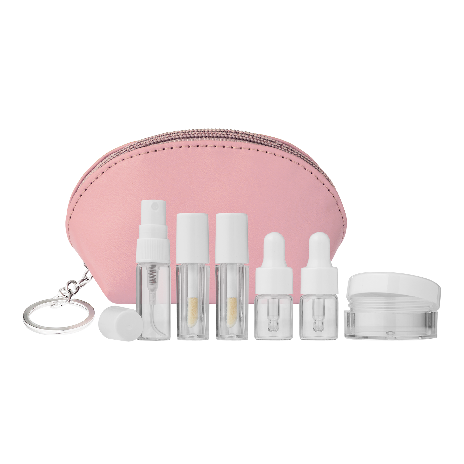 Reseset med rosa necessär och små genomskinliga behållare för skönhetsprodukter, inklusive sprayflaska, applikatorflaskor, pipettflaskor och burk.